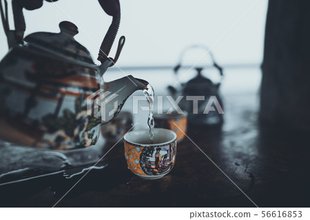 Tea into the cup Chinese teacup hot drink 56616853