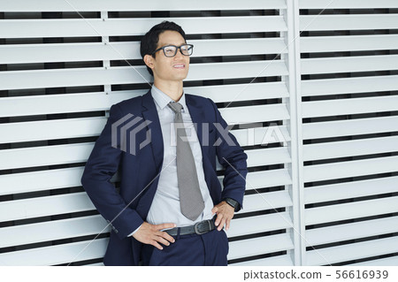 Man breathing a sigh of relief 56616939