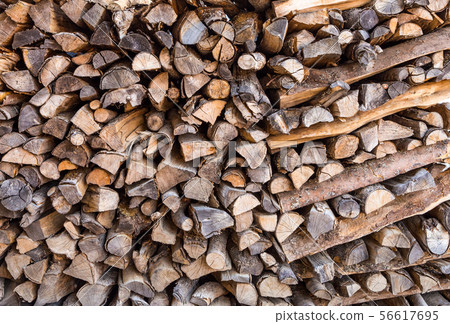 Stack of fire wood for background texture 56617695