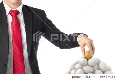 business man invest in gold egg 56617945