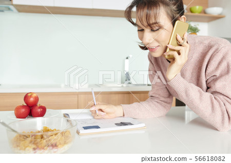 Transgender woman talking on phone Transgender woman talking on phone 56618082
