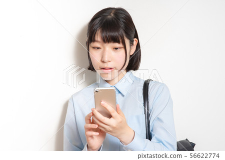 Woman with smartphone Woman with smartphone 56622774