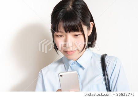 Woman with smartphone Woman with smartphone 56622775
