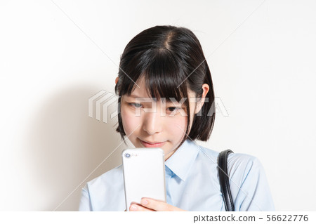 Woman with smartphone Woman with smartphone 56622776