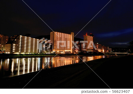 Gold night view of the Muko River flowing behind the Takarazuka Grand Theater 56623407