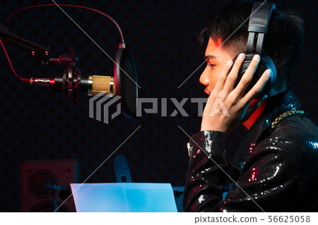 Asian Teenager man sing song loudly power sound 56625058