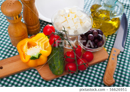 Traditional Greek fresh vegetable salad with feta cheese and herbs Traditional Greek fresh vegetable salad with feta cheese and herbs 56626951