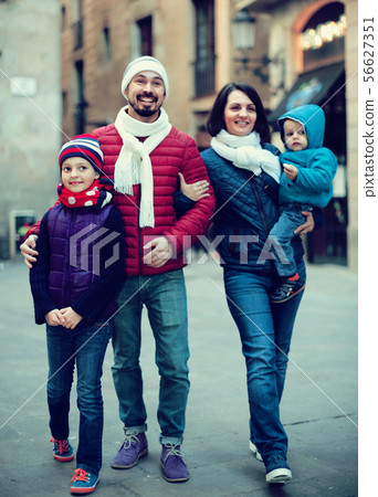 Positive family walking 56627351