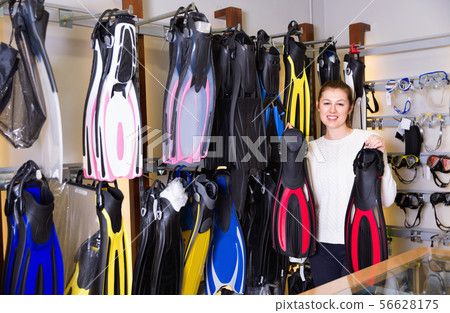 Image of the variety flippers in the diving store. 56628175