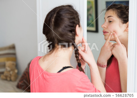Girl cleaning pores Girl cleaning pores 56628705