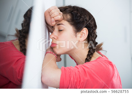Girl being sad Girl being sad 56628755