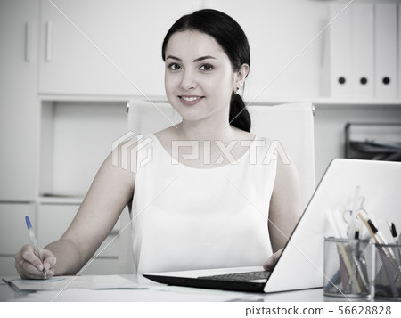 Woman working in office 56628828