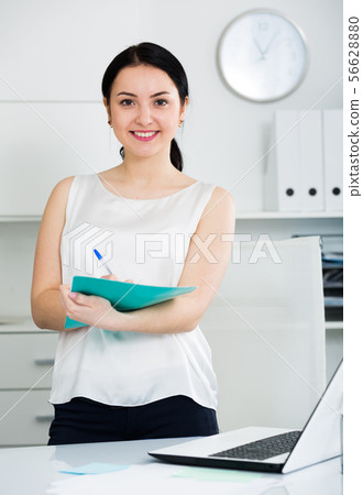 Female manager waiting for clients Female manager waiting for clients 56628880