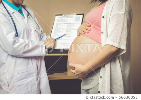 Pregnant Woman and Gynecologist Doctor at Hospital 56630053