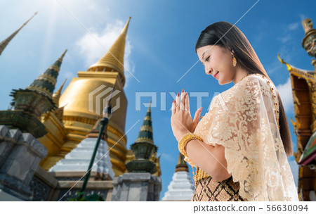 Thai Woman at Temple of the Emerald Buddha Bangkok Thai Woman at Temple of the Emerald Buddha Bangkok 56630094