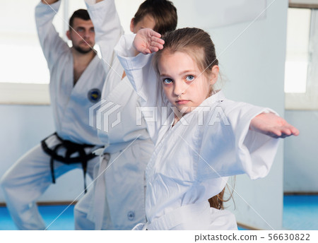 Girls and boys attempting to master new moves 56630822