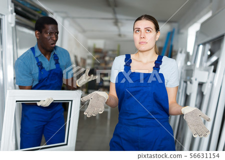 Adult masters are holding modern window frames and conflicting 56631154