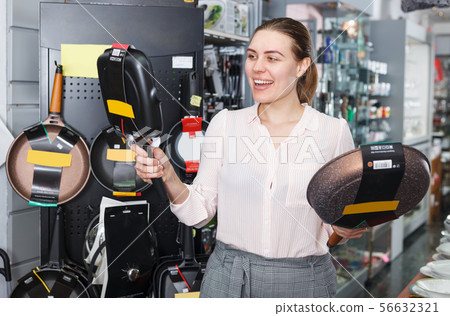 woman is looking stewpot 56632321