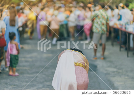 Back view of female in Thai dress take a photo Back view of female in Thai dress take a photo 56633695