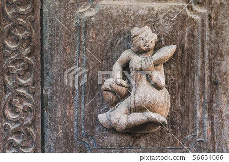 Archaeological, Close Up of carved art figures Archaeological, Close Up of carved art figures 56634066
