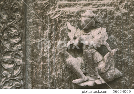 Archaeological, Close Up of carved art figures  56634069