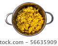 cooked steamed orange quinoa grits in a pan isolated on white background 56635909