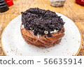 curd ring with poppy seeds on a white plate, top view 56635914