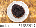 curd ring with poppy seeds on a white plate, top view 56635915
