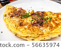 Breakfast food - Omelette with meat, cheese, onion on the white plate 56635974