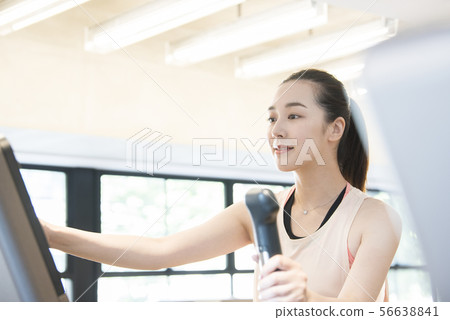 Training young woman 56638841