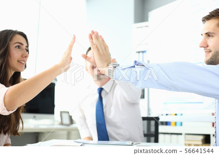 Joyful high five Joyful high five 56641544