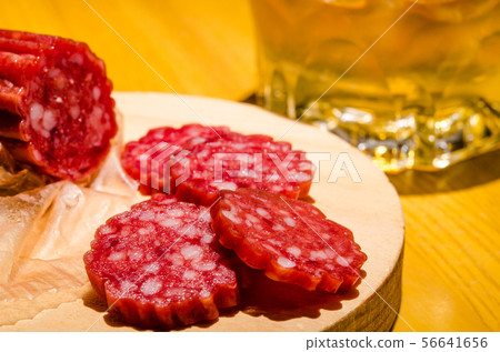 At the bar counter With the lock on the salami bourbon whiskey as a snack At the bar counter With the lock on the salami bourbon whiskey as a snack 56641656