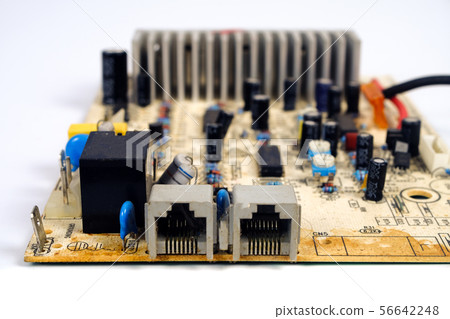 Old and dirty Electronic circuit board close up. Old and dirty Electronic circuit board close up. 56642248