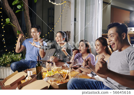 Fans watching sport competition Fans watching sport competition 56645616