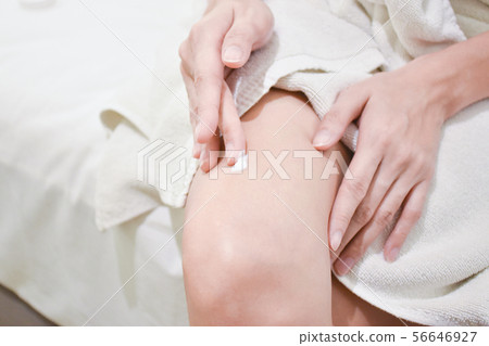 Woman applying legs cream,lotion. 56646927