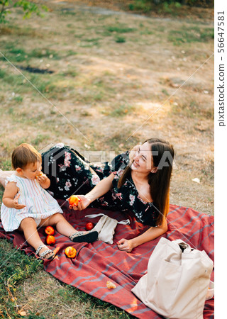 Zero waste summer picnic on the with peaches. Eco friendly parenting. Natural counscious lifestyle 56647581