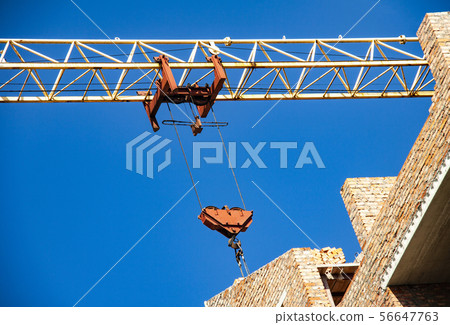 Construction crane and building 56647763