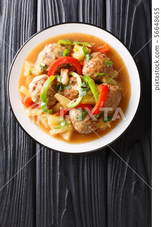 Tasty meatballs with pineapples and vegetables in Tasty meatballs with pineapples and vegetables in 56648655