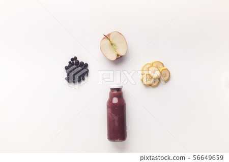 Combination of fresh fruits in glass bottle for healthy nutrition Combination of fresh fruits in glass bottle for healthy nutrition 56649659