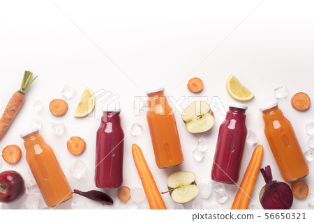 Organic detox cocktails with fresh fruits on white background 56650321