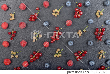 Flat lay view at ripe bilberry raspberry white and Flat lay view at ripe bilberry raspberry white and 56651028