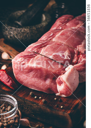 Rolled pork loin joint with different spices Rolled pork loin joint with different spices 56651836