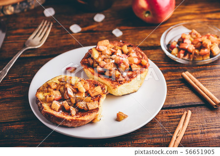 French toasts with apple and cinnamon French toasts with apple and cinnamon 56651905