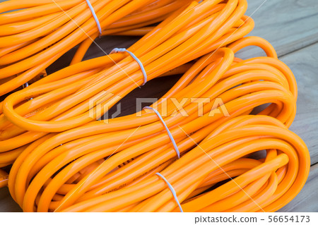Orange electric extension cord Orange electric extension cord 56654173