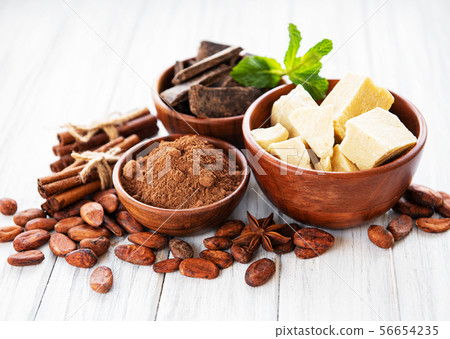 Cocoa beans, chocolate, powder and butter Cocoa beans, chocolate, powder and butter 56654235
