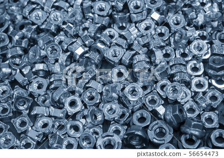 The pile of special purpose nuts . 56654473