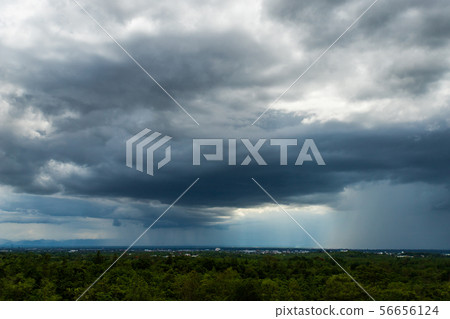 thunder storm sky Rain clouds . 56656124