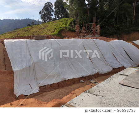 Temporary slope protection using plastic sheets Temporary slope protection using plastic sheets 56658753
