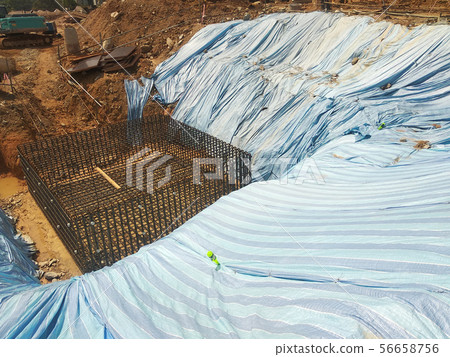 Temporary slope protection using plastic sheets Temporary slope protection using plastic sheets 56658756
