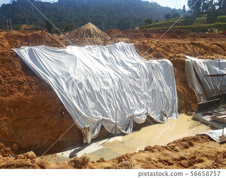 Temporary slope protection using plastic sheets Temporary slope protection using plastic sheets 56658757